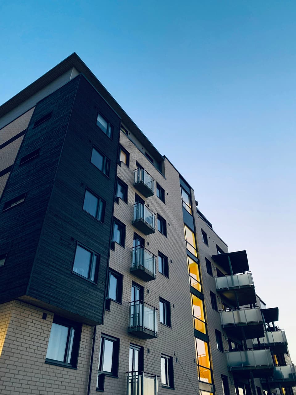 Apartment building exterior at dusk