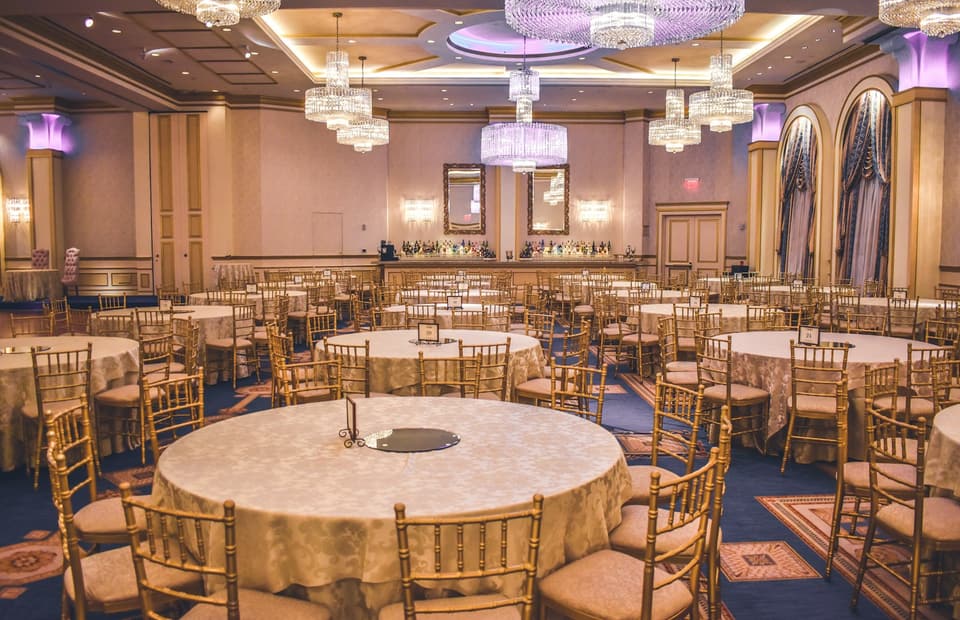Hotel banquet hall set for an event