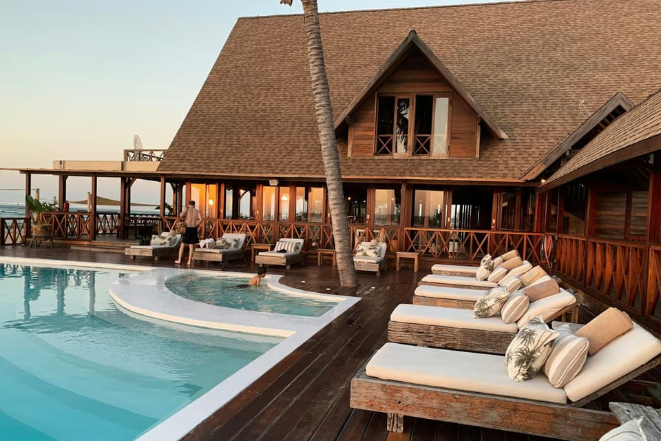 Hotel pool deck with loungers