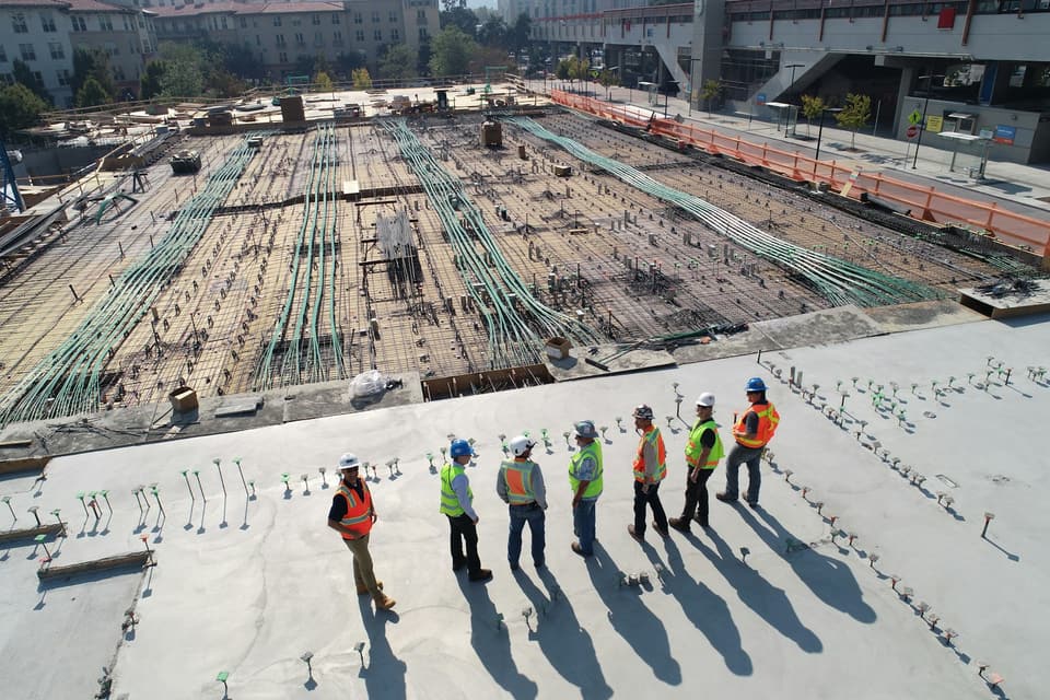 Workers in safety vests on site